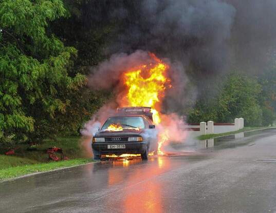 Car on fire needs to be towed